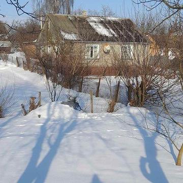 Продам будинок з двома котлами  на газ та тверде паливо!Гараж!