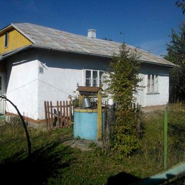 Недорого продам житловий будинок та 30 сотих землі під ним!