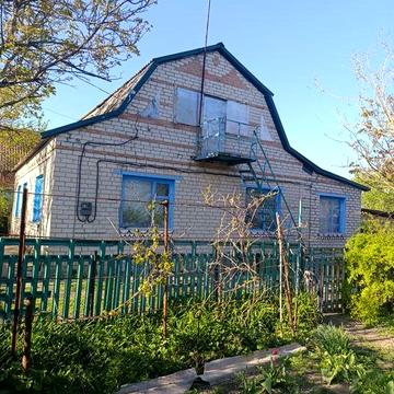 Будинок з великою присадибною ділянкою, гаражем і хоз будівлями