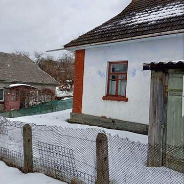 Будинок в місті з земельною ділянкою 6 соток