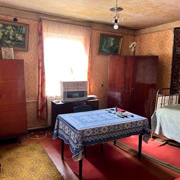 Продам 1/2 будинка в м.Богодухові