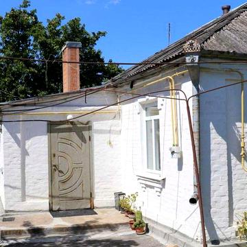 Продам 2 будинки з ділянками які розташовані поряд. ЦІНА за БІЛЬШИЙ