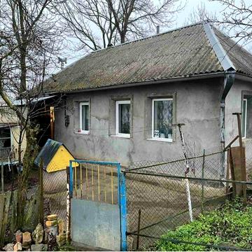 Хата-будинок глинобитна