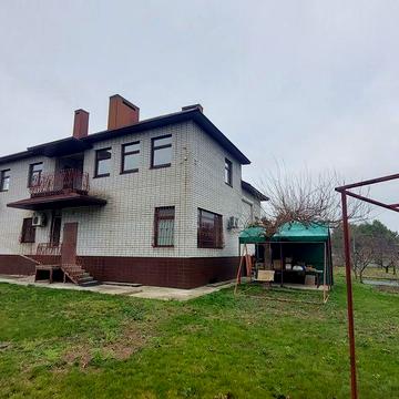 Продам дом в Обуховке, 404 м.кв. за 145000$