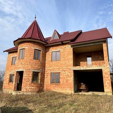 Будинок з земельною ділянкою у Великому Кучурові