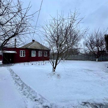 Продається будинок з гаражем деревяний обкладений цеглою вул. Київська