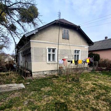 Продаж земельна ділянка 12 сот та будинок Винники вул. І. Франка .