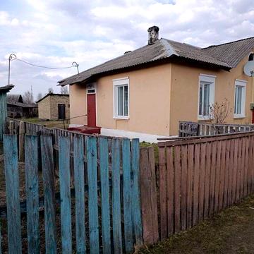 Будинок з криницею