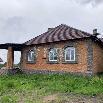 Продам новий будинок і земельну ділянку 25 соток селище Щасливе