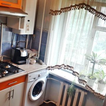 Євгена Коновальця вул., 147