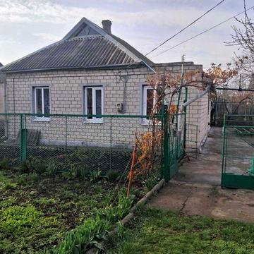 Будинок з приватизованою земельною ділянкою