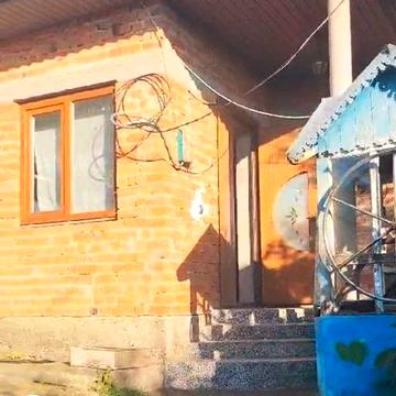 Будинок з господарськими прибудовами