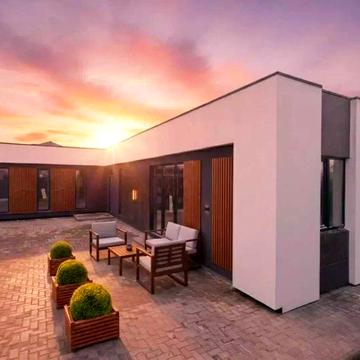 Сучасний будинок площею 145 м² з терасою, ділянка 5 соток