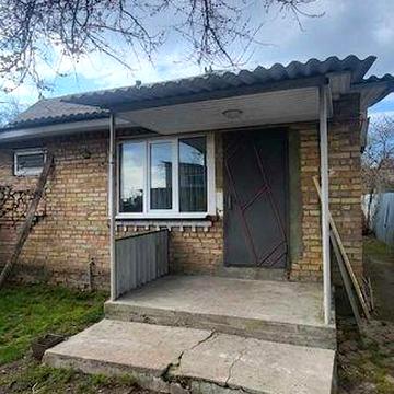 Частина будинку з ремонтом та 8соток землі