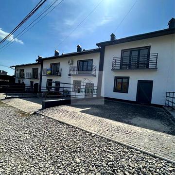 Продам сучасний таунхаус у самому центрі мікрорайону Жовтневого