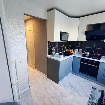 Продам квартиру с евроремонтом + индивидуальным отоплением и гаражом