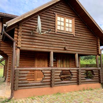 Земельний участок з будинком з сауною