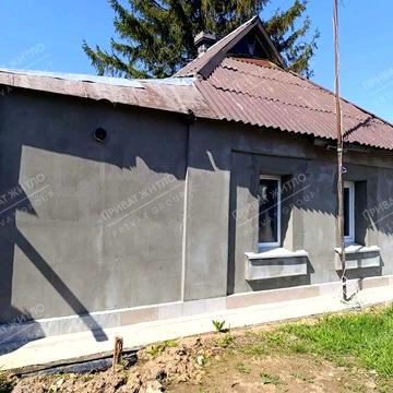Будинок з великою земельною ділянкою в районі ГРЛ!