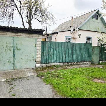 Продаж окремого будинку 59 м² на вул. Олександри Риндовської — ділянка 4.7 сотки, гараж
