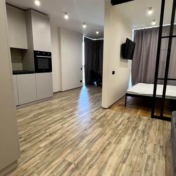 Олега Мудрака вул. (Генерала Наумова), 1-Б