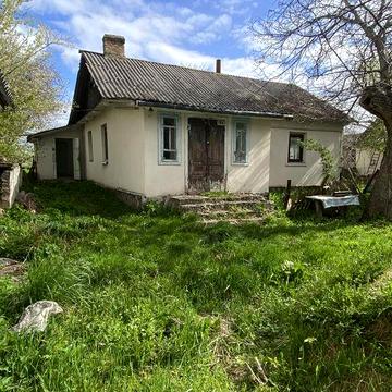 Продаєця будинок