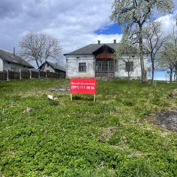 Будинок 135.8 кв.м. та господарське приміщення 88.7 кв.м