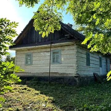 Продається земля зі старим будинком та виходом до озера в селі Припутні.