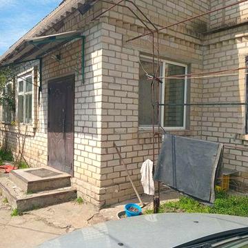 Продам каменный дом в центре Троицкого