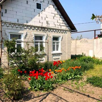 Продаж будинку з гаражем і ділянкою на 10 соток