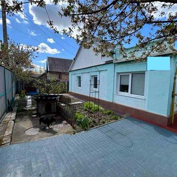 Продаж будинку з літньою кухнею
