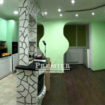 2-кімнатна квартира 91 м² у цегляному будинку з ремонтом і кухнею-студією