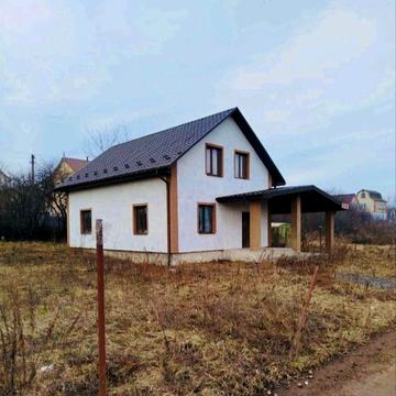 Новий будинок з земельною ділянкою