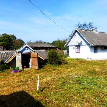Продається в селі Тулиголове біля Комарно житловий будинок із землею