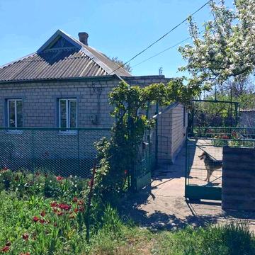 Будинок з приватизованою земельною ділянкою