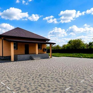 Здається затишний сучасний будинок з великою територією та зручним заїздом.
