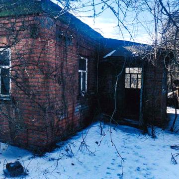 Житловий будинок та споруди, загальною площею 33,30 кв.м у м.Люботин