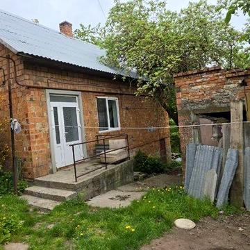 Земельна ділянка 10 с та два будинки. Любі державні програми