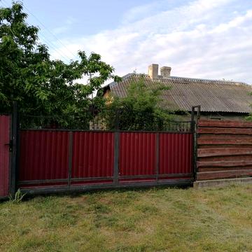 Будинок зі с/г спорудами