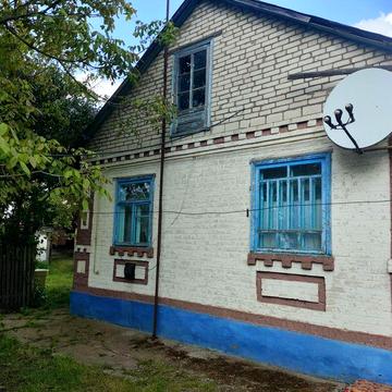 Житловий будинок, земельні ділянки, два окремих входа