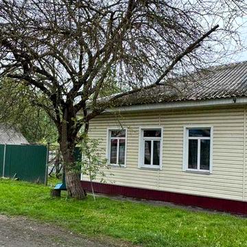 Продам будинок (половина) в Сосниці з землею та господарськими спорудами