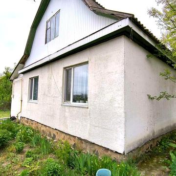Продам жилий будинок та 25сот.землі неподалік від Києва.