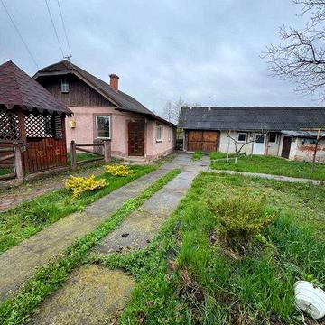 Продаж 1 поверхового будинку з гаражем і ділянкою