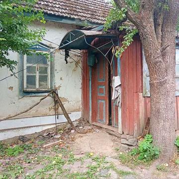 Продається ділянка з будинком в Роменському районі