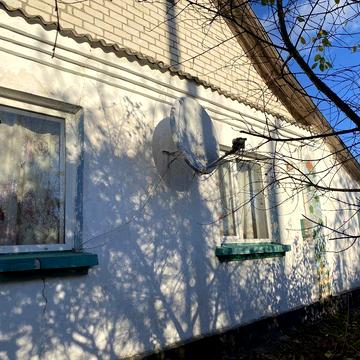 Житловий будинок з надвірними будівлями