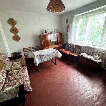 Продаж квартири із земельною ділянкою