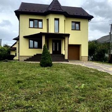 Продається сучасний будинок з ремонтом, гаражем і садом у с. Клочків