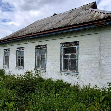 Цегляний будинок з ділянкою 0,54 га
