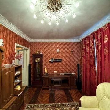 Продам 4 комнатную квартиру в центре