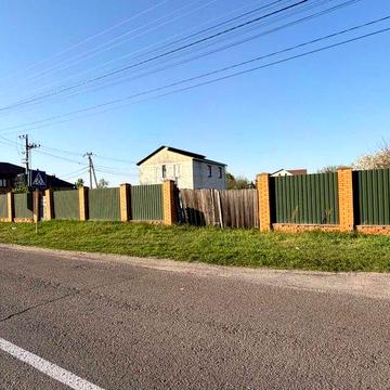 Продаж двоповерхового цегляного будинку 18 соток с. Рожівка