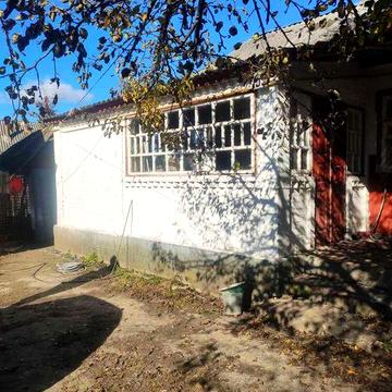 хата в селі Іванів Хмельницького району